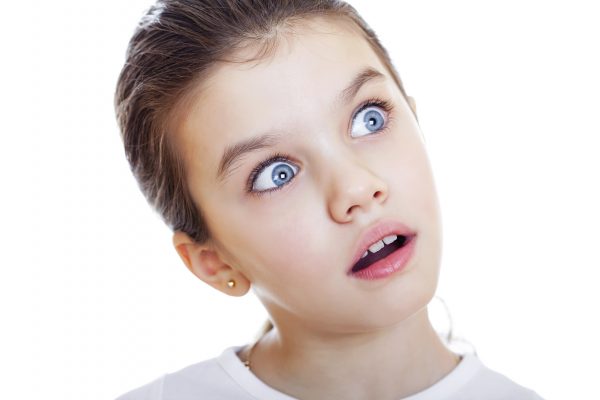 Crazy little girl, studio on white background