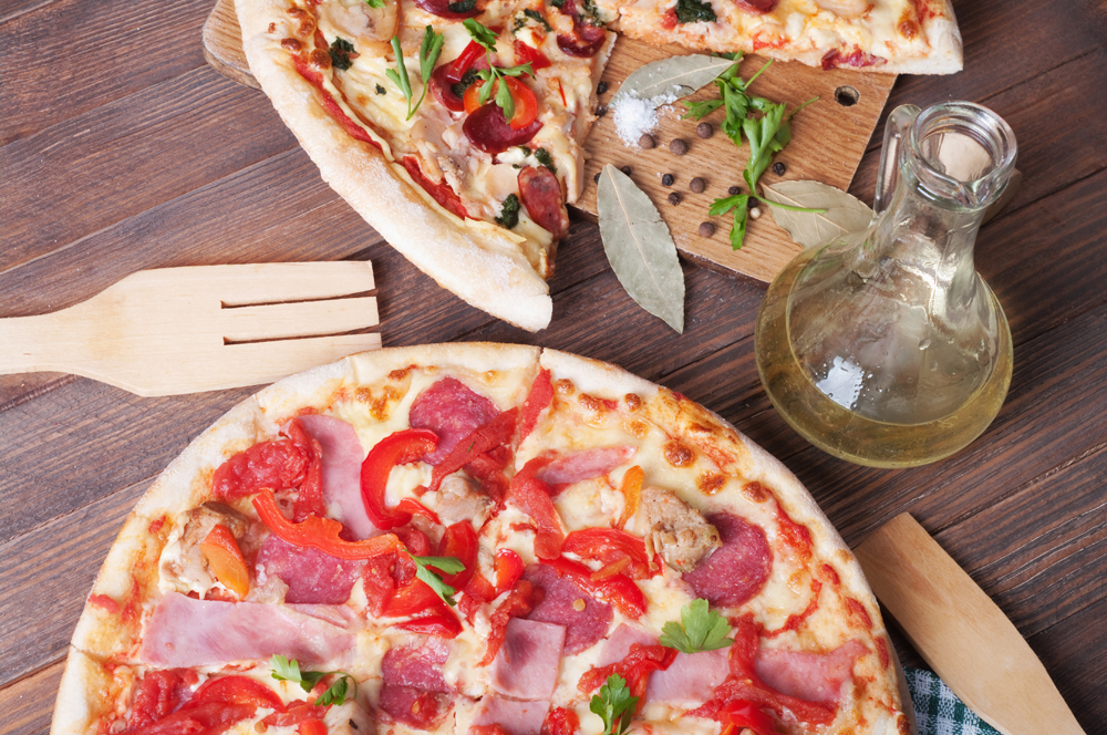 italian pizza on wooden table