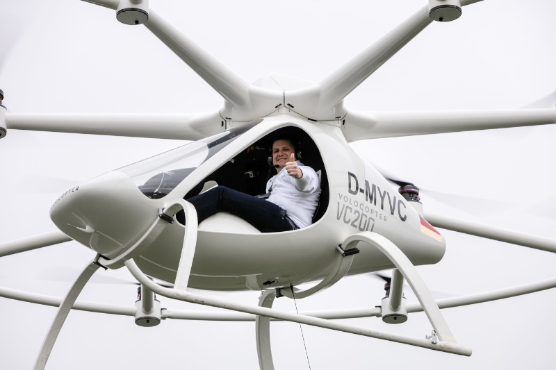 World premiere of manned flights in the Volocopter. e-volo Managing Director Alexander Zosel gives thumbs up to his team for the flight performance of the Volocopter.Location: Airfield in Southern Germany (PRNewsFoto/e-volo)