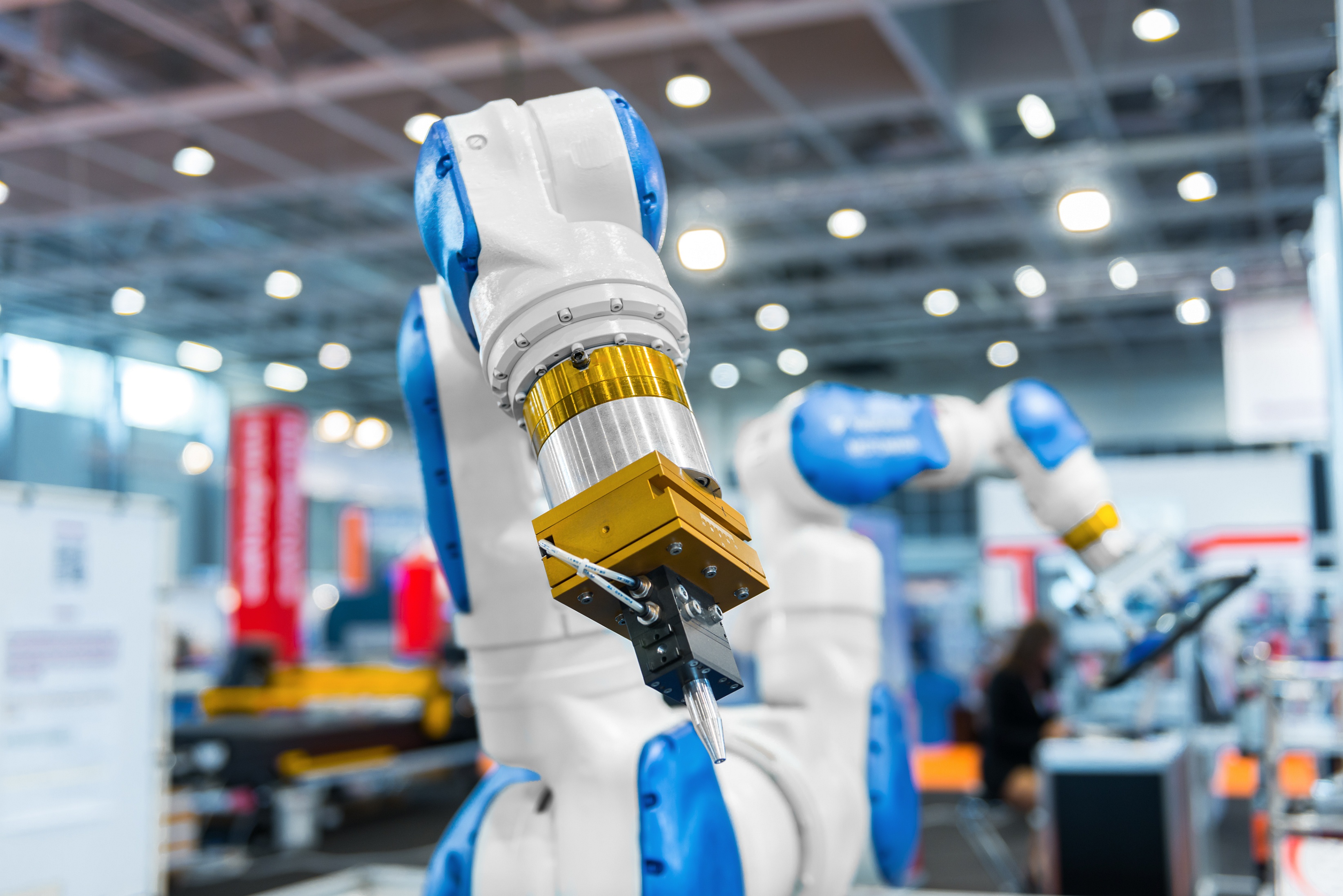 Robot arm in a factory working for the humans