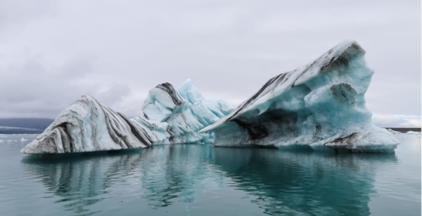 A humbug iceberg, with black stripes steaking through the white ice