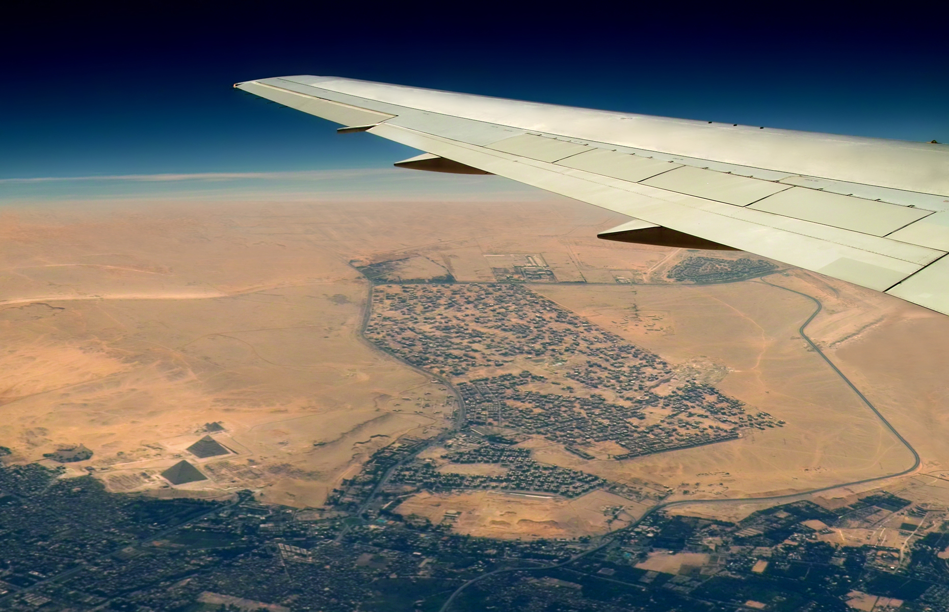 Aiplane above pyramids Littlegate Publishing