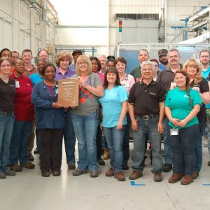 Employees from BorgWarner&apos;s manufacturing facility in Seneca, South Carolina, proudly display their latest Excellence in Quality Award from Honda North America. Since 2002, the plant has earned 12 supplier awards from Honda, including seven awards for quality, four for delivery and one for engineering innovation. (PRNewsFoto/BorgWarner Inc.)