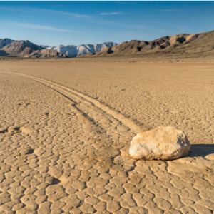 A 'sailing stone' sat in the middle of a desert, a trail behind it as if it moved